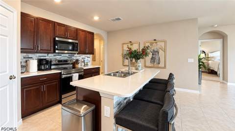 20076 Fiddlewood Ave, North Fort Myers FL - photo 9 of 34