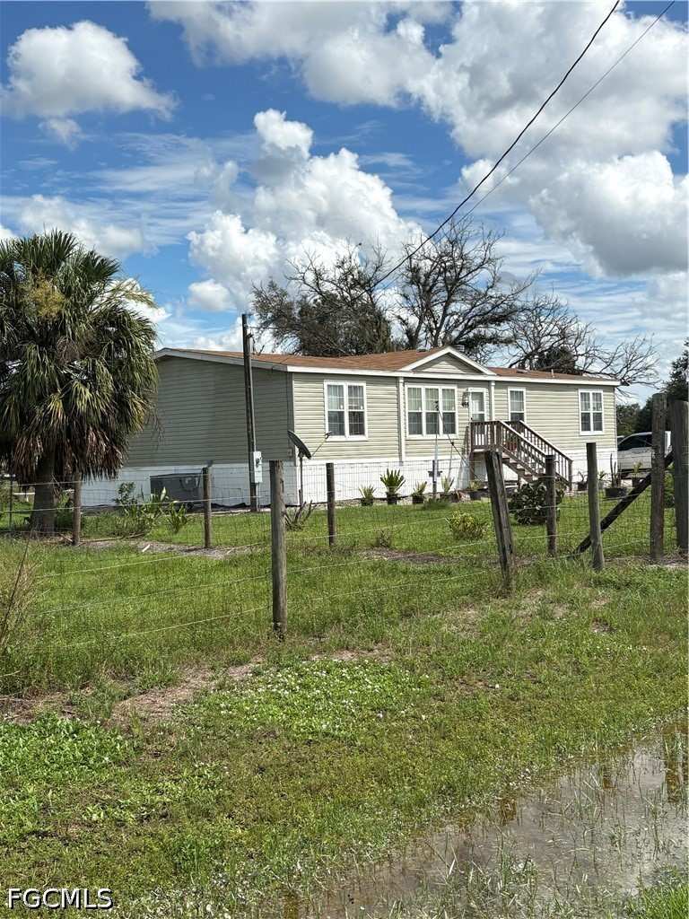 3 bedroom SingleFamilyResidence at 455 N Datil St, Montura Ranch Estates, Clewiston — photo 1