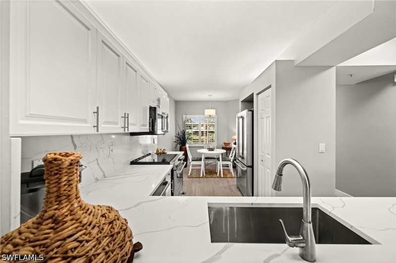 2 bedroom Condominium at 7502 Silver Trumpet Ln 103, Pipers Grove, Naples — photo 1