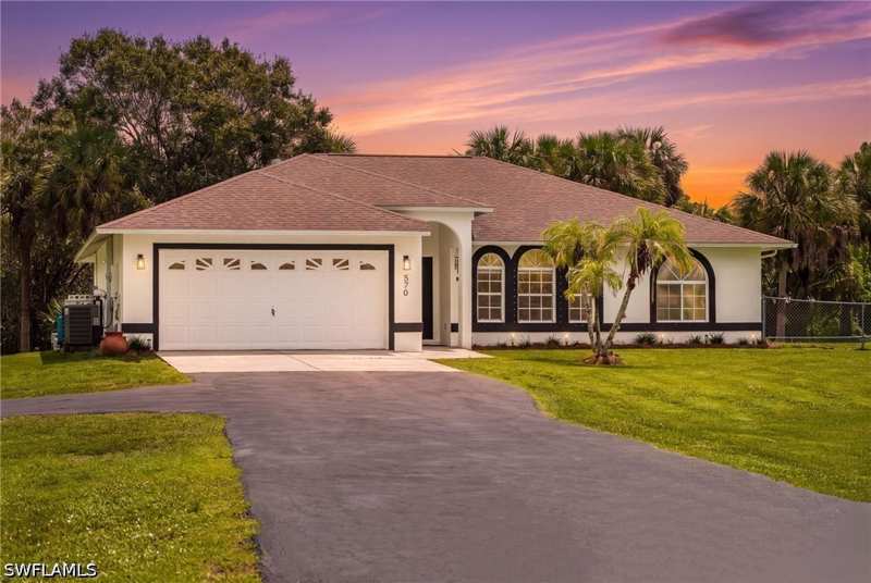 3 bedroom SingleFamilyResidence at 570 22nd St NE, Golden Gate Estates, Naples — photo 1