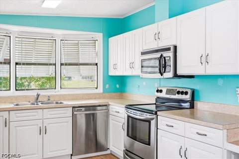 10074 Broken Woods Ct, North Fort Myers FL - photo 12 of 45