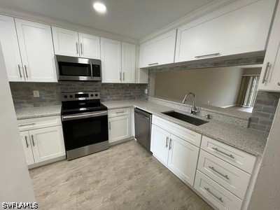 2 bedroom Condominium at 1200 Commonwealth Cir 103, Abbey At Berkshire Village, Naples — photo 1
