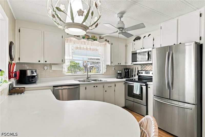 2 bedroom ManufacturedHome at 151 Overland Trl, Carriage Village, North Fort Myers — photo 1
