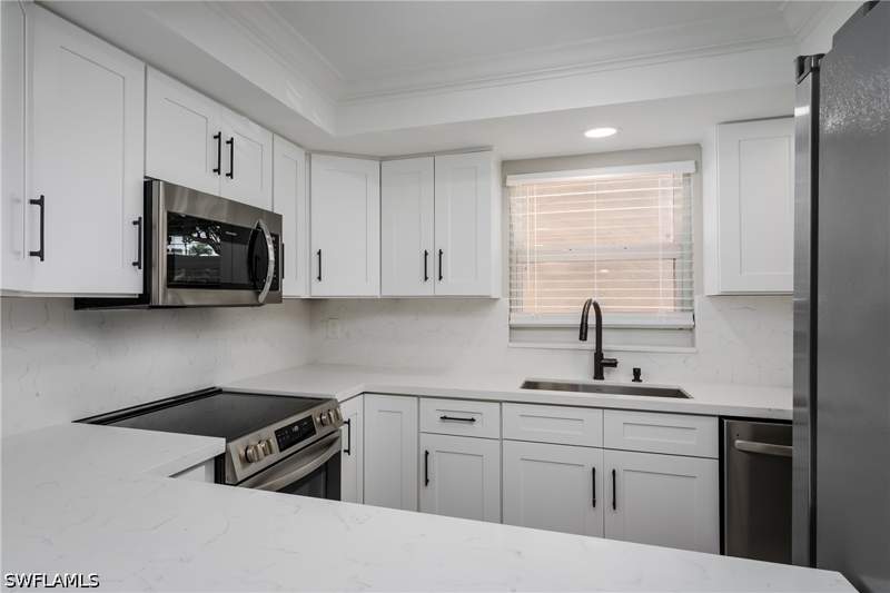 2 bedroom Condominium at 5419 Rattlesnake Hammock Rd 107F, Country Club Manor, Naples — photo 4