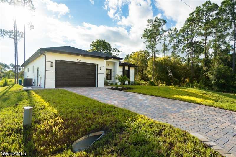 4 bedroom SingleFamilyResidence at 327 Lownde Ave S, Lehigh Acres, Lehigh Acres — photo 1