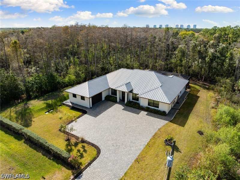 5 bedroom SingleFamilyResidence at 25526 Busy Bee Dr, San Carlos Estates, Bonita Springs — photo 1