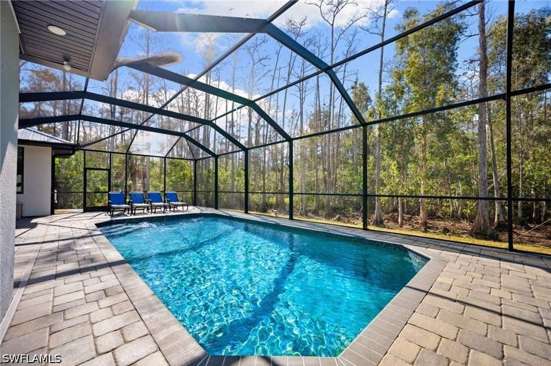 5 bedroom SingleFamilyResidence at 25526 Busy Bee Dr, San Carlos Estates, Bonita Springs — photo 2