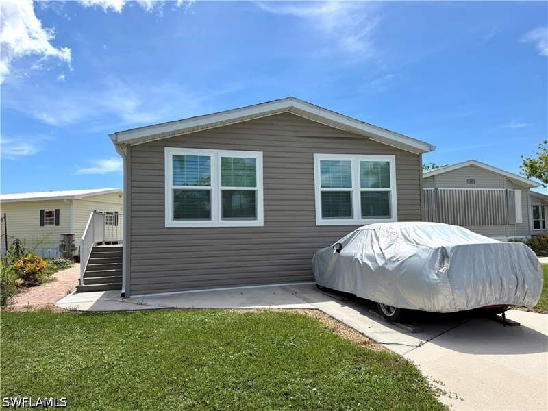 2 bedroom ManufacturedHome at 4521 Sawmill Dr E, Riverwoods Plantation, Estero — photo 2