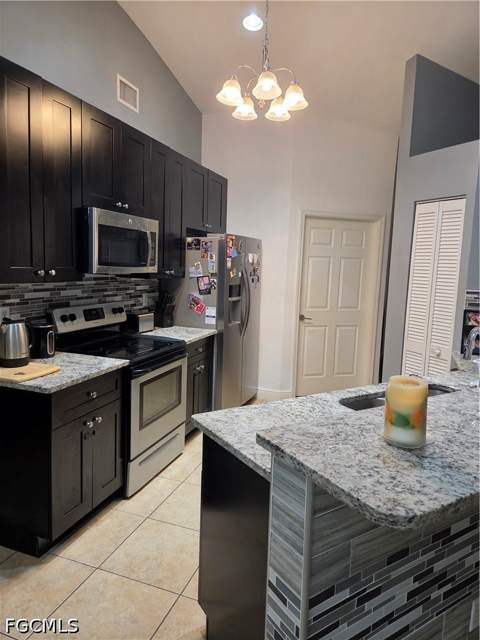 1025 Iris St E, Lehigh Acres FL - photo 22 of 41