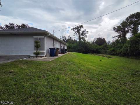 1025 Iris St E, Lehigh Acres FL - photo 9 of 41