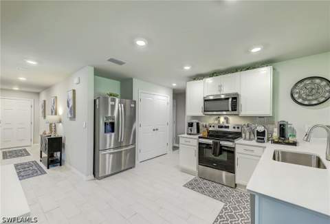 806 Gaylord Ave S, Lehigh Acres FL - photo 6 of 38