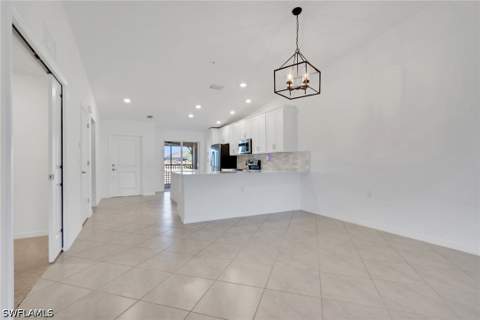 6047 Ellerston Way SW 2125, Ave Maria FL - photo 9 of 29
