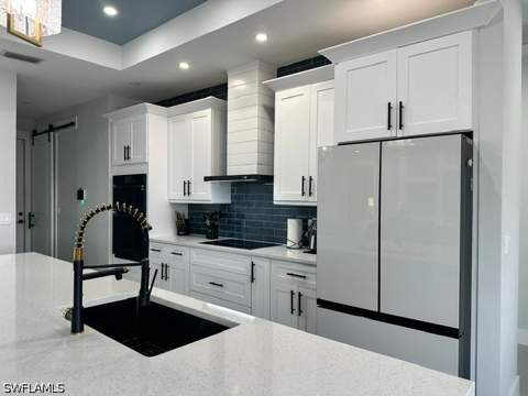 1013 Chaplin Ave, Lehigh Acres FL - photo 7 of 42