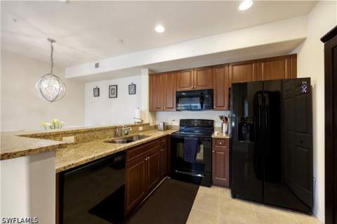13180 Bella Casa Cir 166, Fort Myers FL - photo 7 of 35
