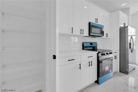1031 Cedartree Ave, Lehigh Acres FL - photo 13 of 25