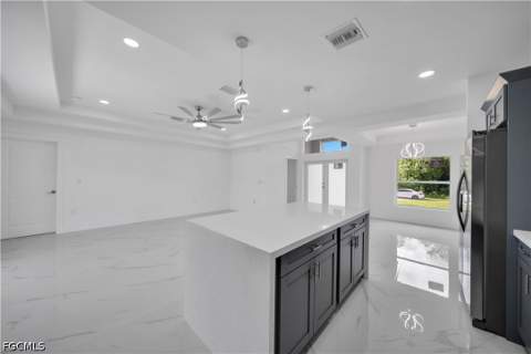 1021 Pilgrim St E, Lehigh Acres FL - photo 7 of 39