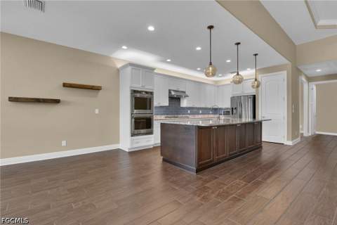 10505 Valencia Lakes Dr, Bonita Springs FL - photo 8 of 61