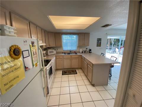 407 Plumosa Ave, Lehigh Acres FL - photo 6 of 18