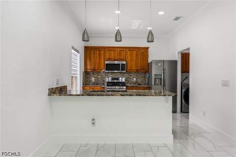 4449 Varsity Lakes Dr, Lehigh Acres FL - photo 10 of 57