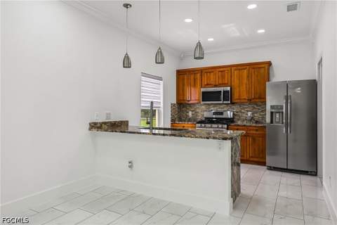 4449 Varsity Lakes Dr, Lehigh Acres FL - photo 11 of 57