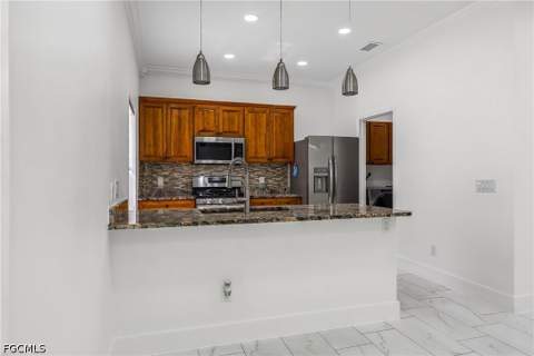 4449 Varsity Lakes Dr, Lehigh Acres FL - photo 12 of 57