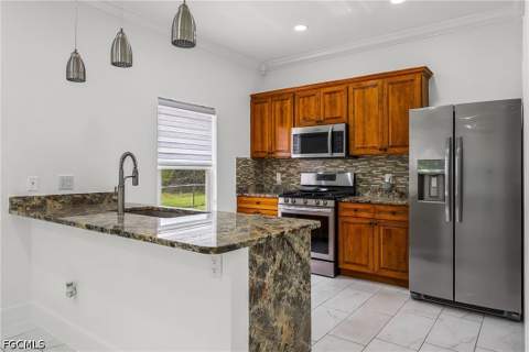 4449 Varsity Lakes Dr, Lehigh Acres FL - photo 13 of 57
