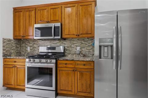 4449 Varsity Lakes Dr, Lehigh Acres FL - photo 14 of 57