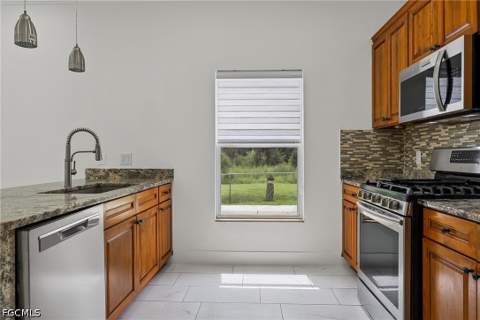4449 Varsity Lakes Dr, Lehigh Acres FL - photo 15 of 57