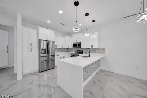 325 Leruth Ave, Lehigh Acres FL - photo 8 of 36