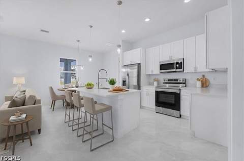 1927 Richmond Ave N, Lehigh Acres FL - photo 10 of 49