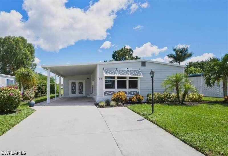 3 bedroom ManufacturedHome at 50 Le Mans Dr, Riviera Golf Estates, Naples — photo 1
