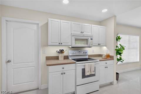 1042 Harwood Ave S, Lehigh Acres FL - photo 8 of 38