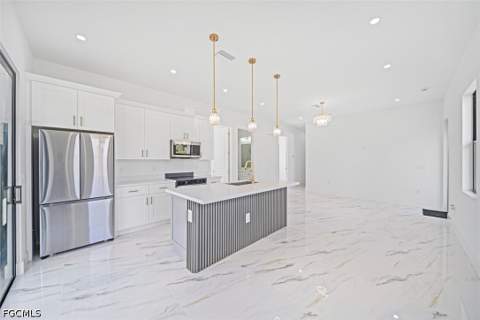 1005 SW Brenton Ave, Lehigh Acres FL - photo 6 of 26