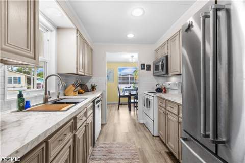 506 Blossom Ct, North Fort Myers FL - photo 9 of 35