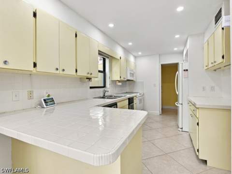 845 Collier Ct 203, Marco Island FL - photo 10 of 34