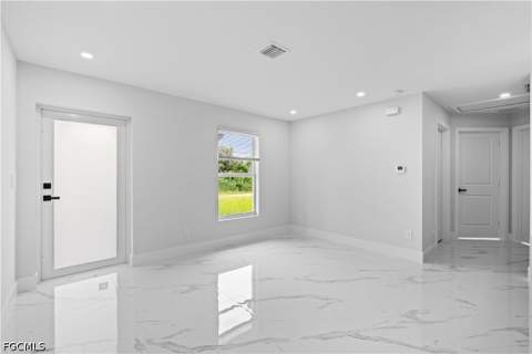 755 Fleming Ave S, Lehigh Acres FL - photo 7 of 33