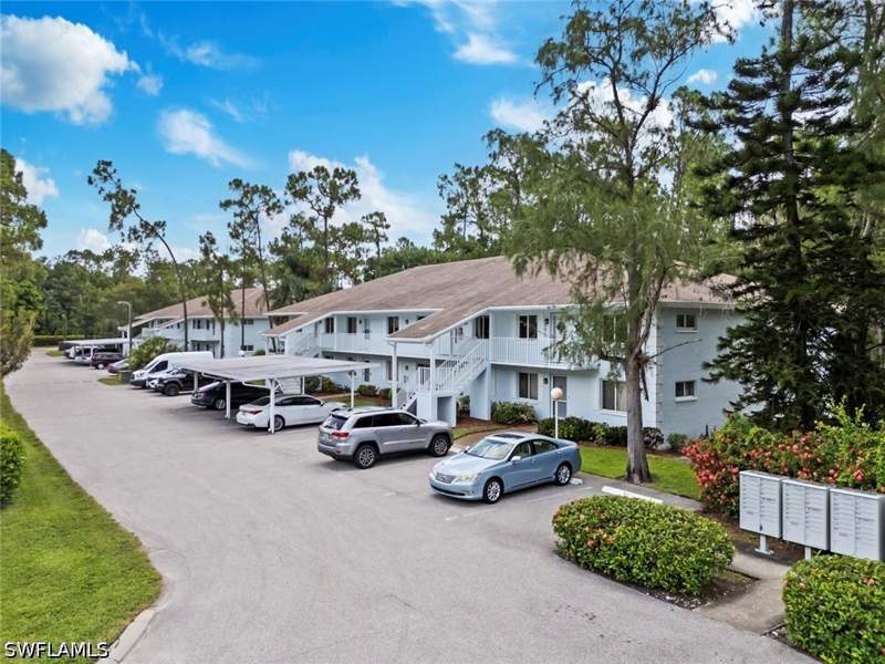 2 bedroom Condominium at 3531 County Barn Rd 201, Woodmere Racquet Club, Naples — photo 2