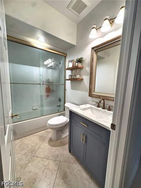 710 Tarpon Cove Dr 103, Naples FL - photo 9 of 12
