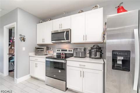 1413 SW Trafalgar Pkwy, Cape Coral FL - photo 9 of 43