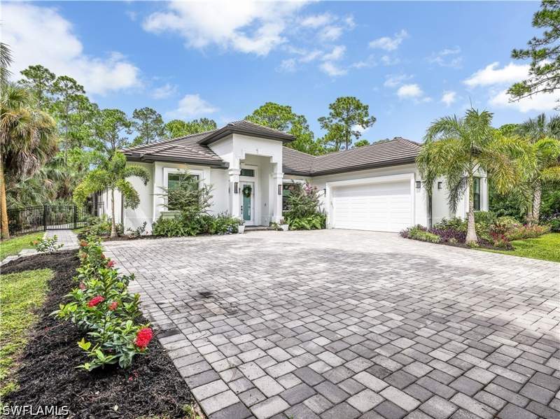 5 bedroom SingleFamilyResidence at 855 1st St NW, Golden Gate Estates, Naples — photo 2