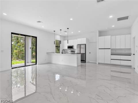 792 Bell Blvd S, Lehigh Acres FL - photo 10 of 57