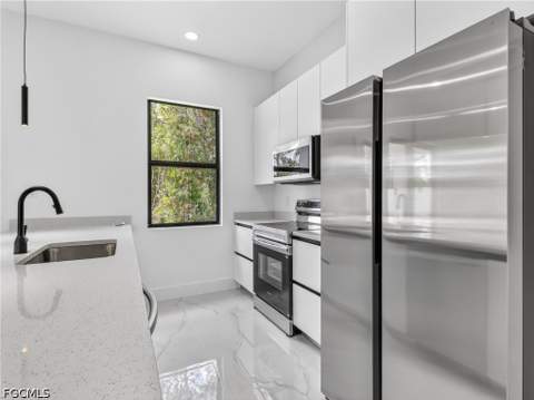 792 Bell Blvd S, Lehigh Acres FL - photo 7 of 57