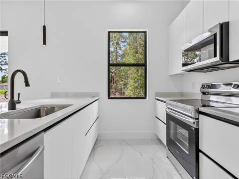 792 Bell Blvd S, Lehigh Acres FL - photo 8 of 57