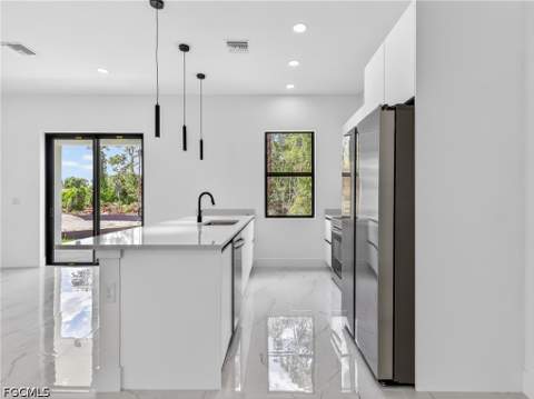 792 Bell Blvd S, Lehigh Acres FL - photo 9 of 57