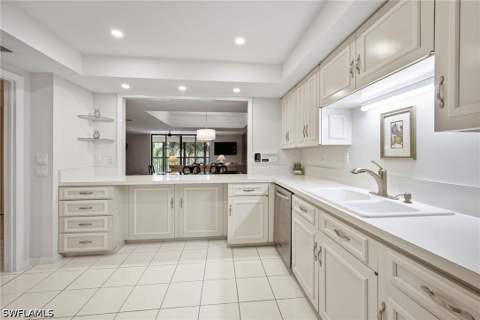 6075 Pelican Bay Blvd 201, Naples FL - photo 7 of 49