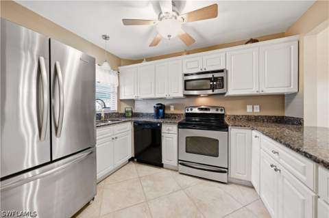 201 Quail Forest Blvd 103, Naples FL - photo 9 of 30