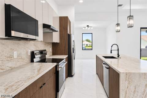 2127 NE 34th Ter, Cape Coral FL - photo 7 of 48