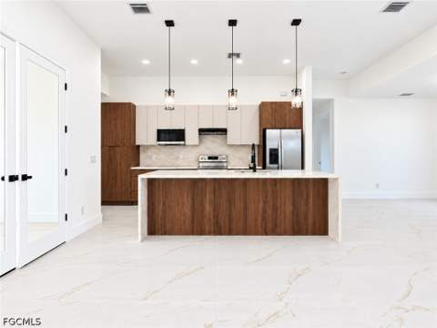 2127 NE 34th Ter, Cape Coral FL - photo 9 of 48