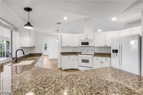 310 SE 23rd St, Cape Coral FL - photo 8 of 30