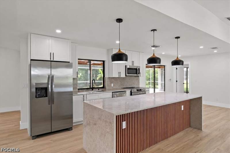 4 bedroom SingleFamilyResidence at 18682 Spruce Dr E, San Carlos Park, Fort Myers — photo 5